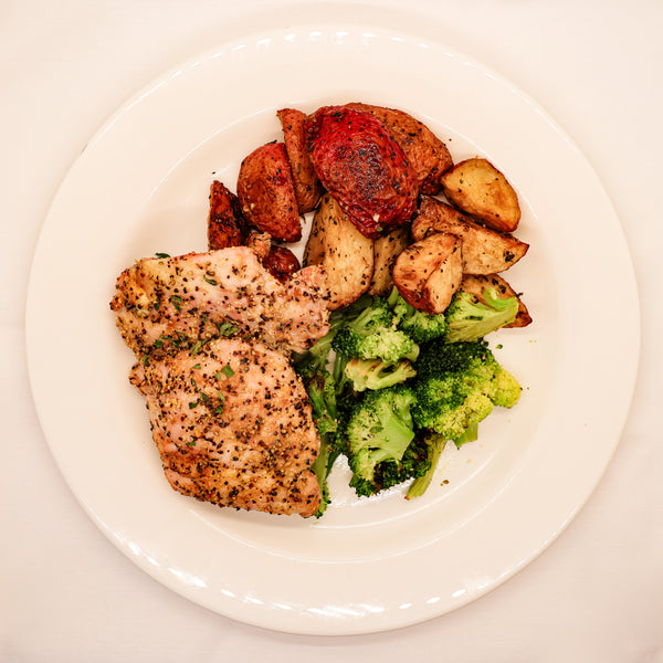 Lemon Pepper Chicken Thighs with Roasted Potatoes and Steamed Broccoli